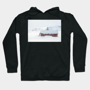 Snow covered Sami cabin in the mountains of Lapland Hoodie